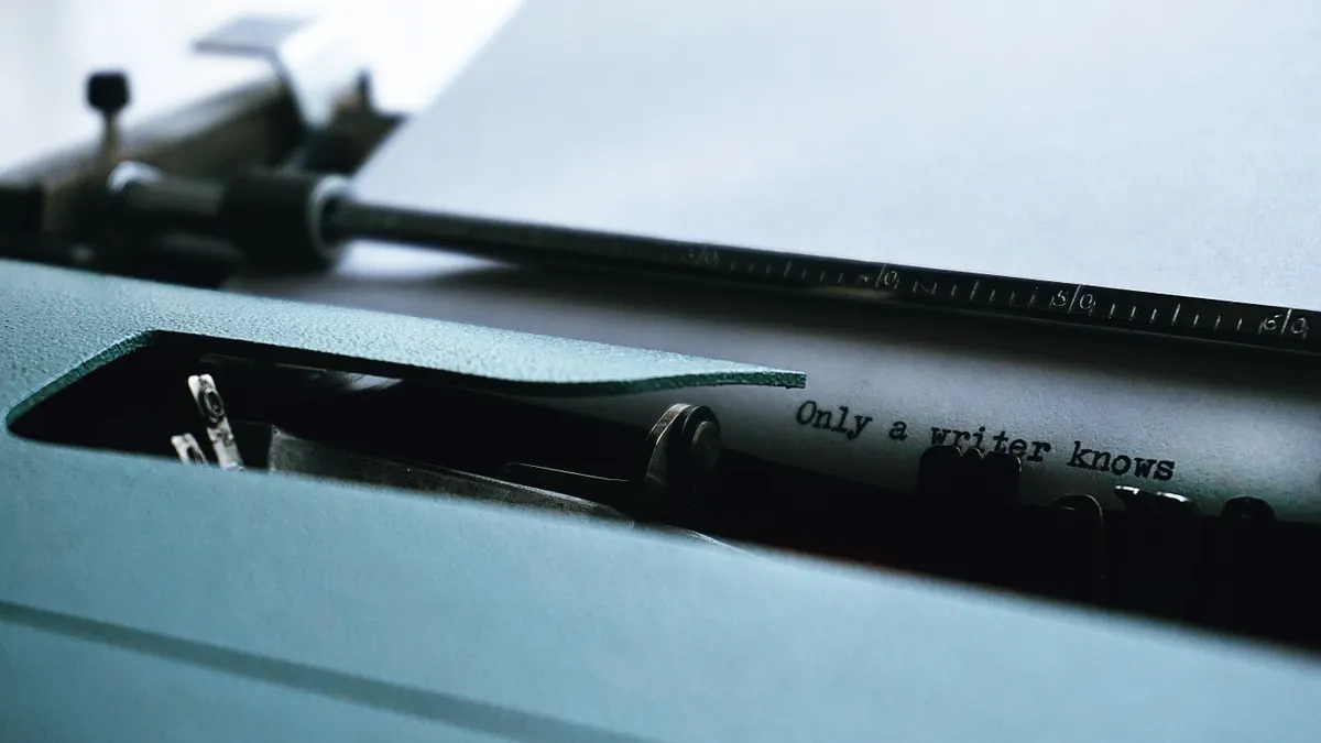 AI Article Writer Reviews for Agencies: Tools That Fit Client Workflows — Close-up Photography of Typewriter With Only a